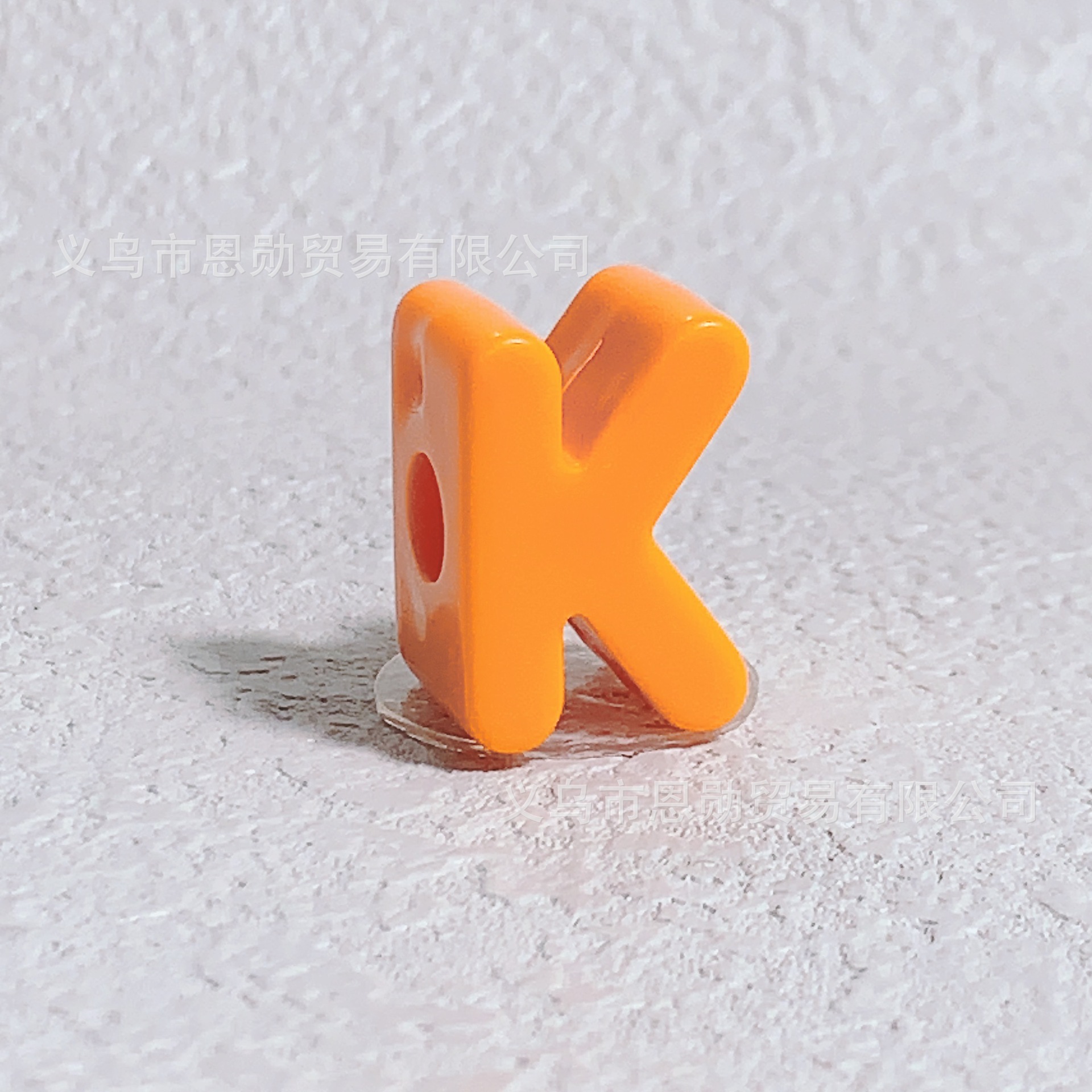 K (Orange)