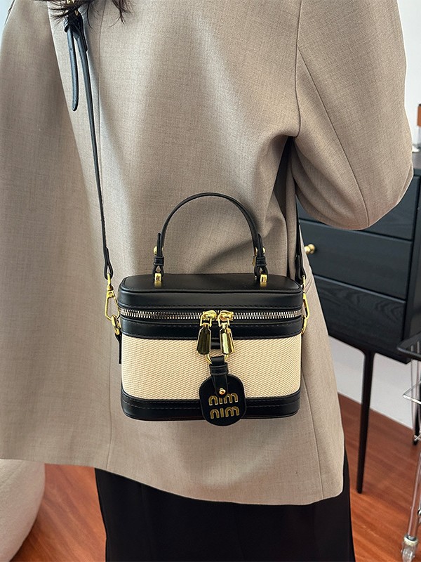 Caja de mano retro bolso cuadrado para mujeres 2025 comercio exterior transfronterizo nueva moda de color contrastante empalme mochila de hombro