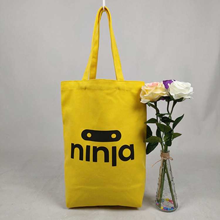 厂家直销 黄色时尚英文帆布袋 手提棉布袋可加印Logo图案
