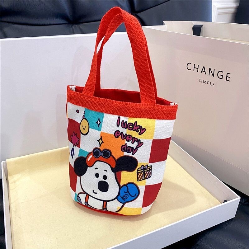 かわいい落書きバケツバッグinsプリント円筒バッグキャンバス弁当袋韓風少女は弁当箱を持っています。|undefined
