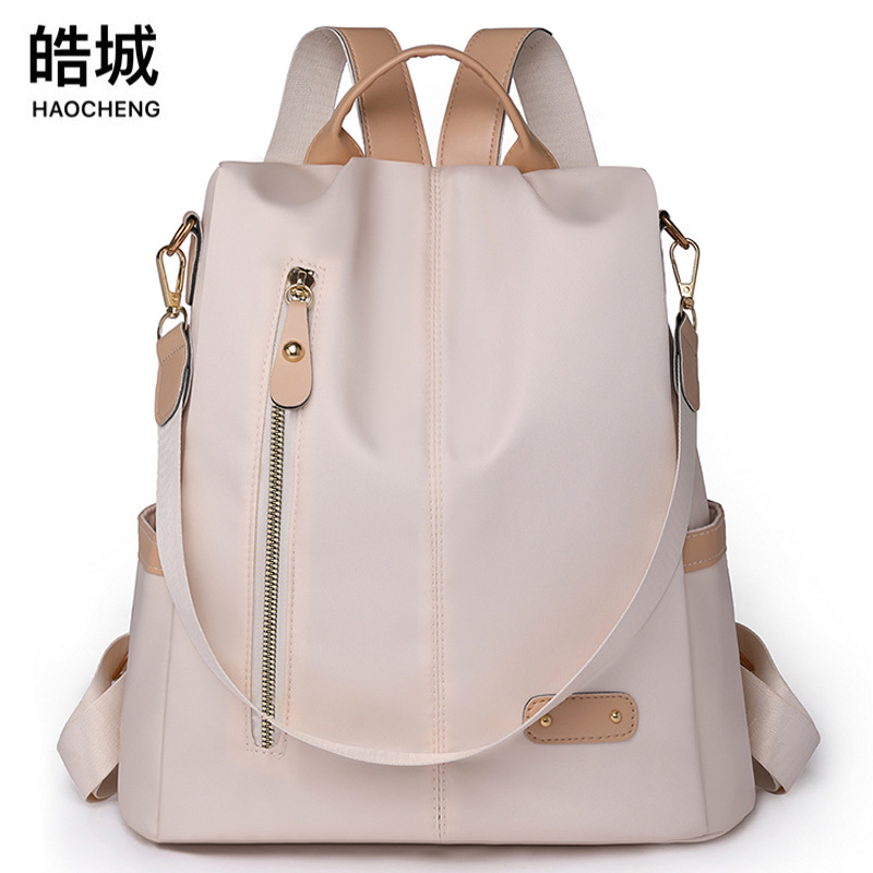 2024 verano nuevas señoras casual mochila antirrobo moda contraste color nylon remache mochila de viaje mochila escolar