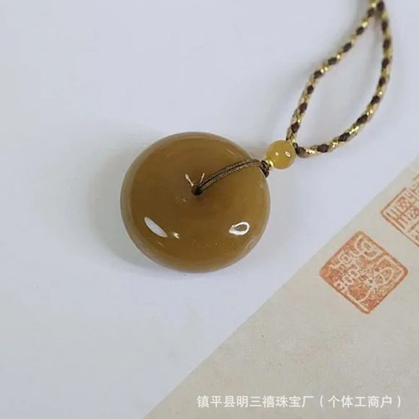 Protective amulet from Khotan district white jade