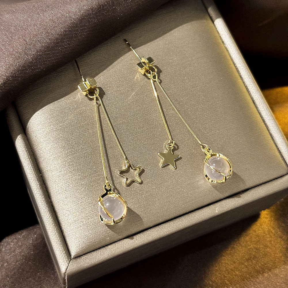 32 # Estrella ojo de gato borla oro