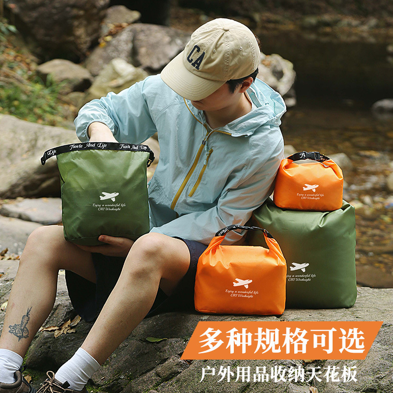 Outdoor travel storage bag, roll-top style, large capacity, ultra-lightweight, portable, hangable, wear-resistant, for storing clothes and miscellaneous items Outdoor travel storage bag, roll-top style, large capacity, ultra-lightweight, portable, hangable, wear-resistant, for storing clothes and miscellaneous items