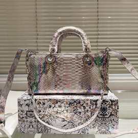 Popular lizard-print handbag, perfect for carrying or cross-