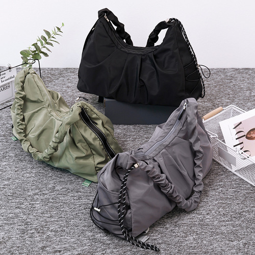 Large-capacity casual crossbody bag for women  new pleated bag college student commuter drawstring neutral class shoulder bag