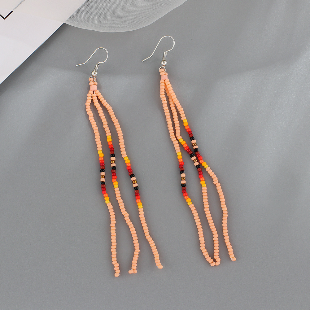 Summer Bohemian handmade tassel rice beads earrings women's long temperament European and American woven earrings earrings wholesale