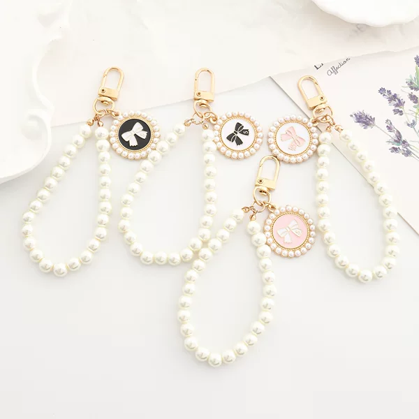 New Pearl Car Keychain Pendant Creative Bow Pearl Round Plate Accessories Headphone Cover Women's Bag Decoration