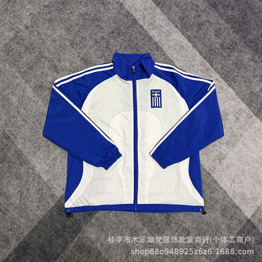 Greek team windbreaker jacket in white and blue, classic casual sportswear with embroidered logo, long-sleeved football warm-up jacket
