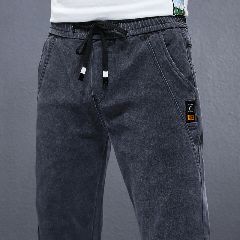 Elastic waist jeans men's loose washed harem pants Spring and Autumn new mid-waist skinny casual trousers 2021