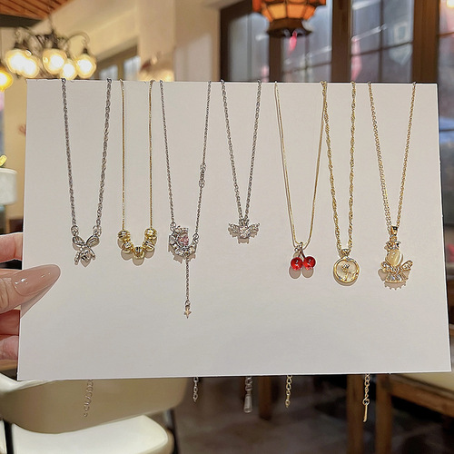 Korean new pearl necklace for women, versatile temperament, loving titanium steel clavicle chain, high-end design neck chain wholesale