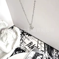 Saturn key necklace