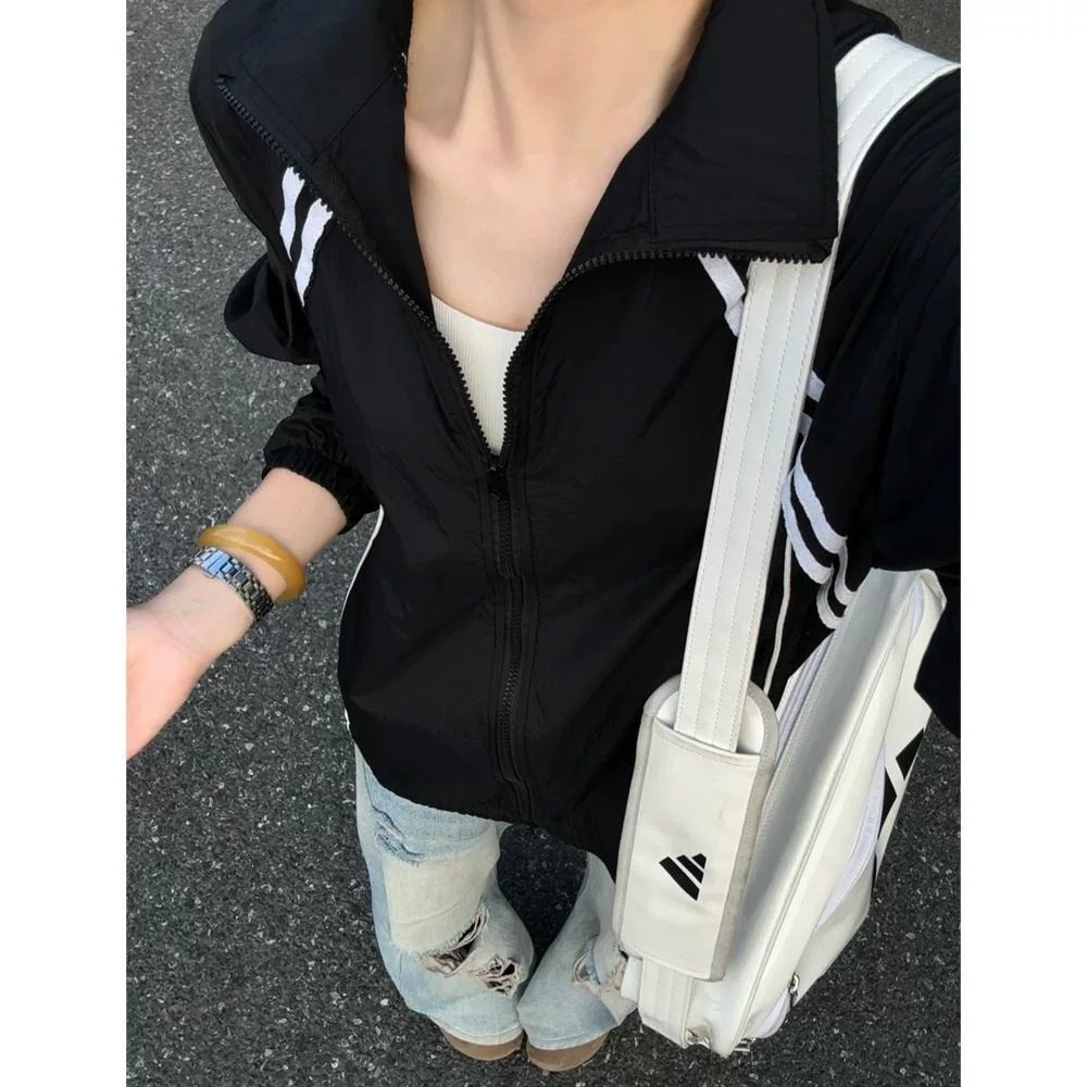 Sporty striped sun protection jacket for men and women, lightweight, breathable, loose fit, slimming, stand-up collar, and straight shoulders, perfect for summer.