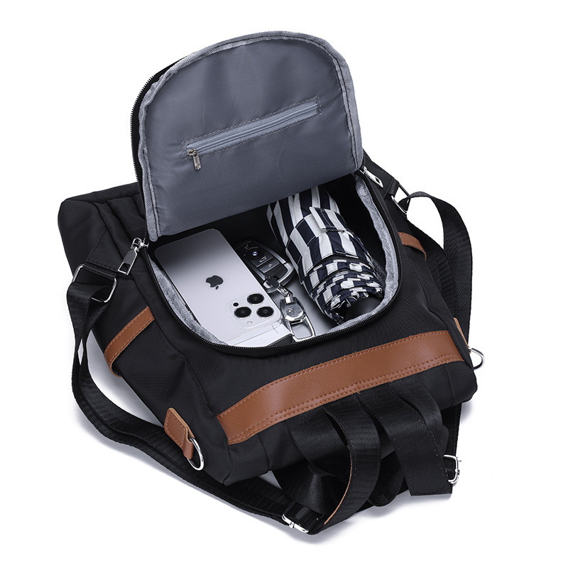 Mochila de tela Oxford para mujer casual al por mayor transfronteriza 2023 Mochila de viaje antirrobo simple de moda