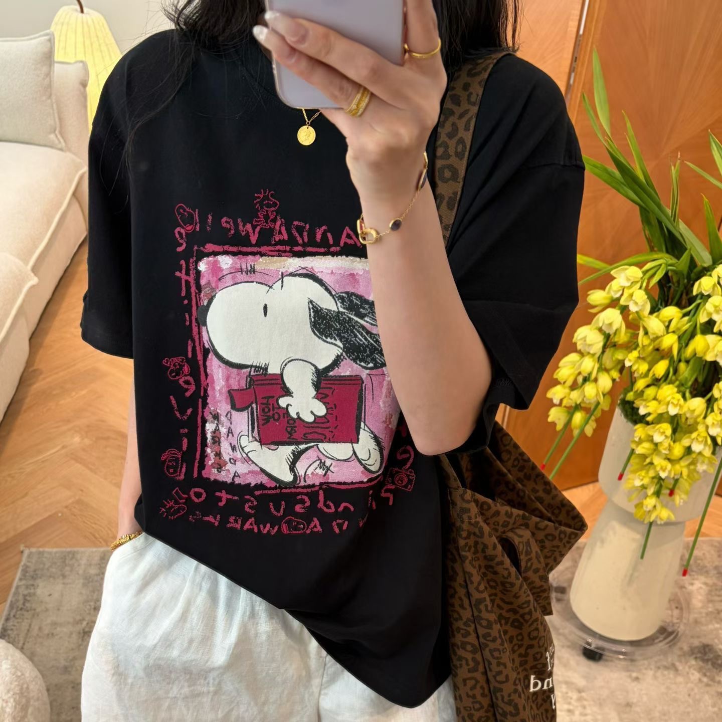 2026 nueva impresión coreana de dibujos animados Snoopy suelta camiseta de manga corta de cuello redondo de mujer de moda de moda image 9