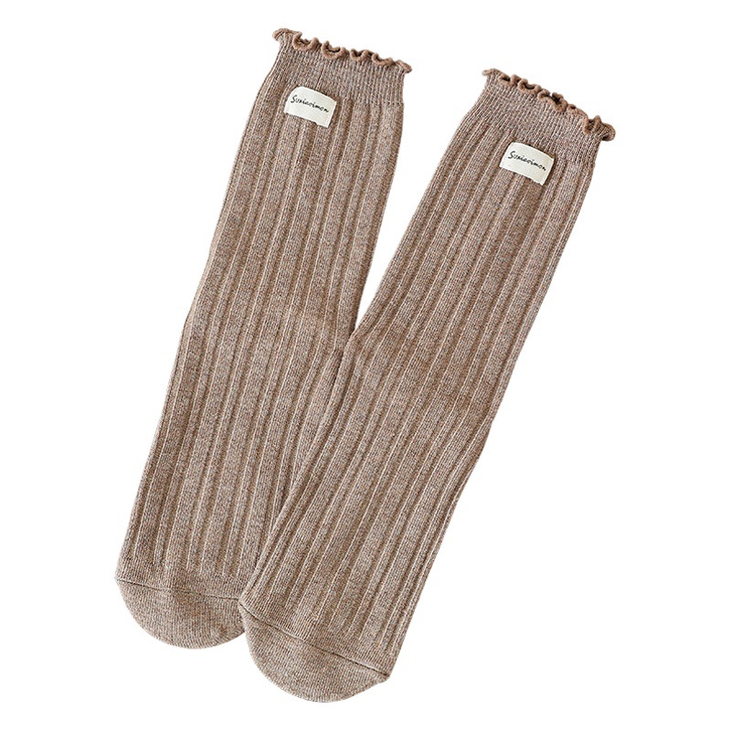 Calcetines de punto doble Primavera y otoño calcetines de media pantorrilla calcetines de algodón de color sólido para mujer calcetines de pila de oreja de madera calcetines de mujer Zhuji al por mayor