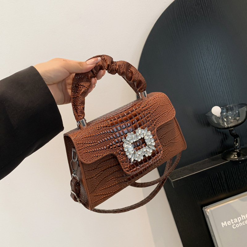 Bolso de alta sensación para mujeres 2024 otoño nuevo bolso de mano con patrón de cocodrilo brillante, bolso de hombro casual, bolso de mochila cuadrado