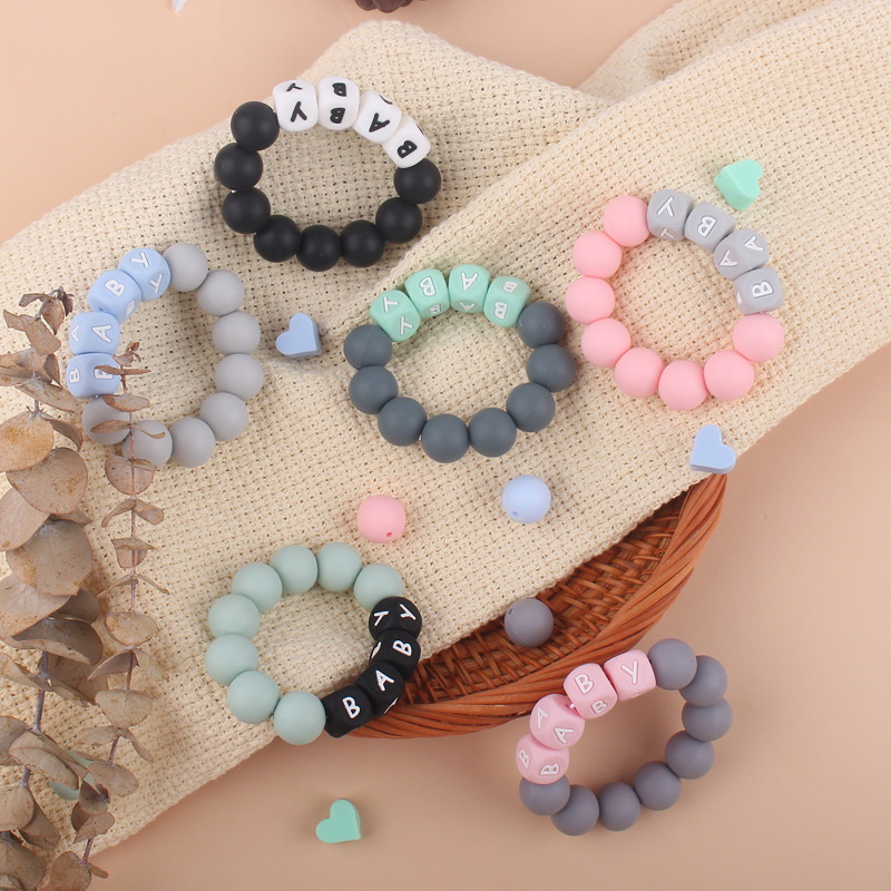 Nuevo bebé suministros mordedor pulsera creativa DIY nombre colorido de silicona letras mordedura juguete