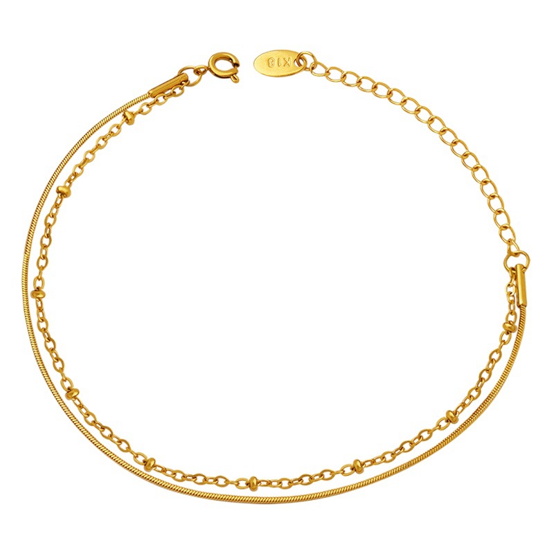 Europeo y americano ins joyería meticulosa de doble capa de la cadena de hueso de serpiente exquisita pulsera bolsa de cadena de cuentas de acero de titanio chapado en oro de 18 quilates pulsera E085