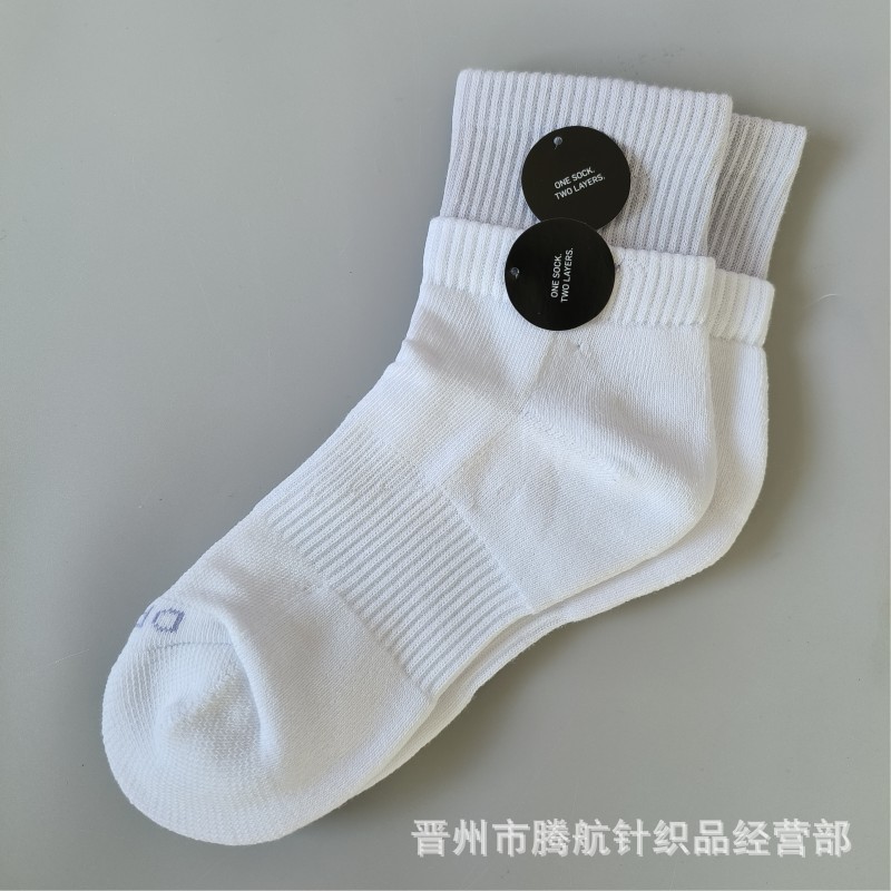 蘇万ナイキの靴下のカラーの二重は男女の中で長い筒のタオルの底のスポーツの靴下をつなぎ合わせてバスケットボールの靴下を走ります。