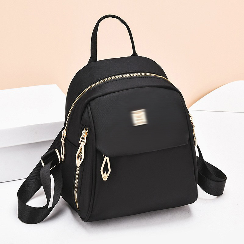 Mochila para mujer, nuevo estilo, para damas de mediana edad, mochila pequeña de viaje de cuero suave, mochila escolar de tela Oxford de doble uso, bolsos de hombro