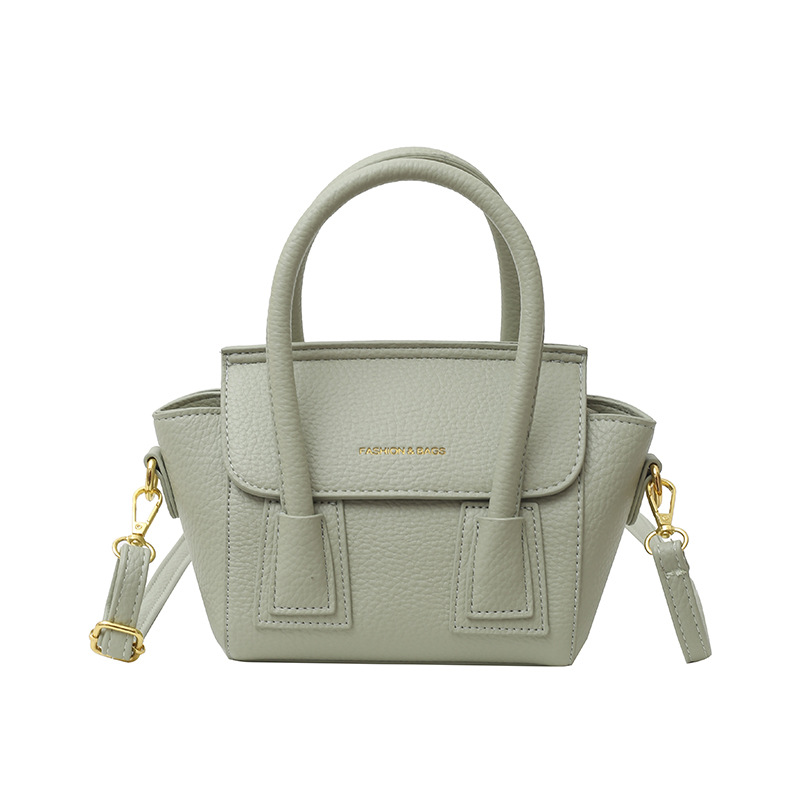 Bolsos populares de este año 2025 primavera nuevo bolso femenino casual patrón de lichi bolso de hombro letra todo fósforo bolso de mensajero