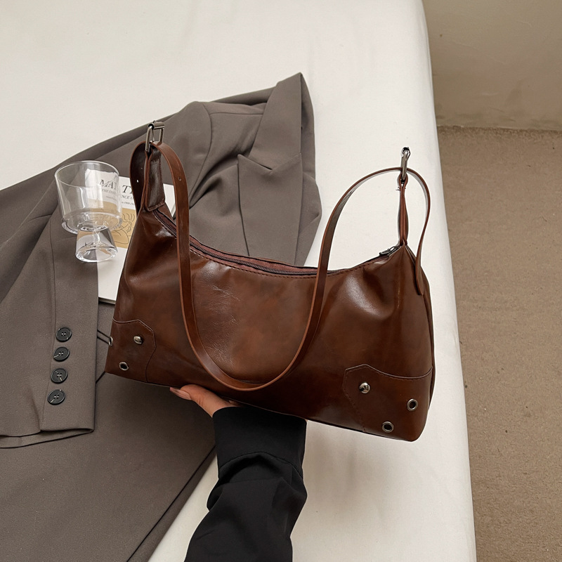 Niche Zhong retro Meilade bolso de brazo para mujeres otoño / invierno 2025 nuevo estilo de estilo extranjero multifuncional de gran capacidad bolso de hombro retro