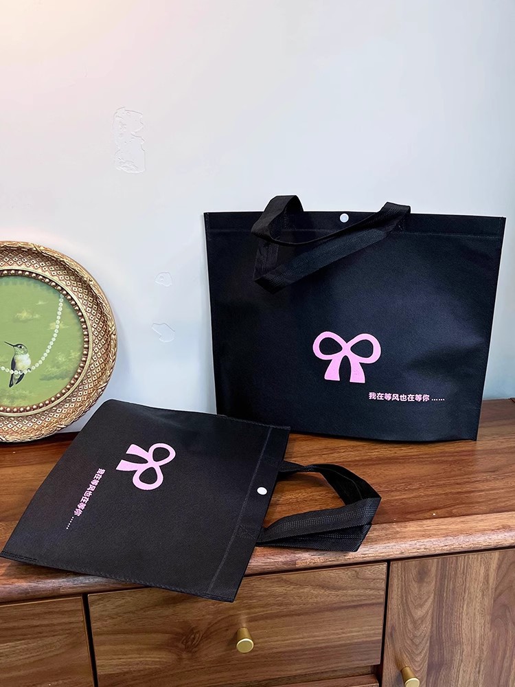 Pajarita; tamaño pequeño 35*26* fondo 8CM; nuevo material de tela no tejida