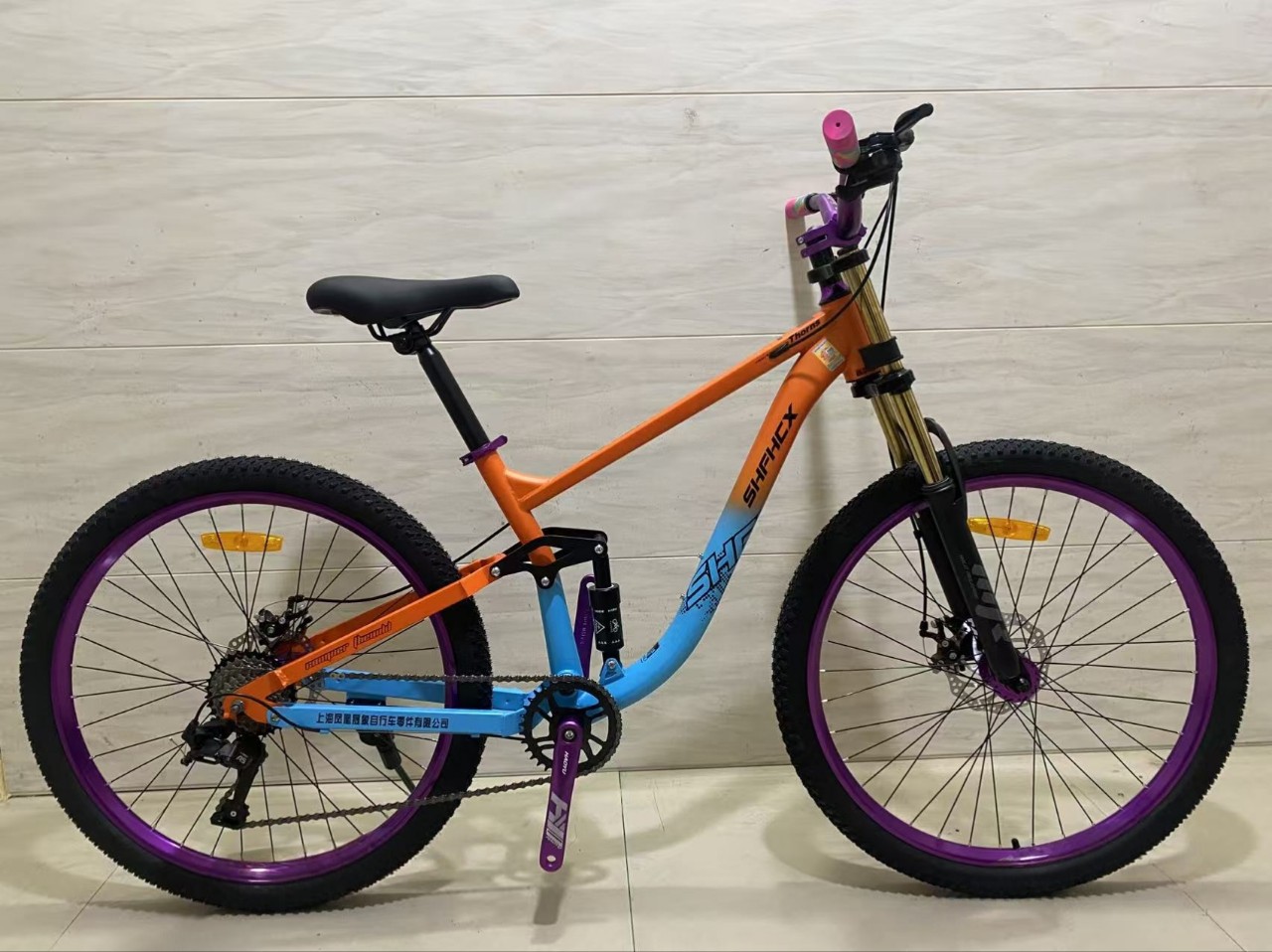 Fábrica al por mayor de bicicletas de montaña de cola suave para adultos bicicletas para hombres y mujeres doble amortiguación de carretera 26 pulgadas