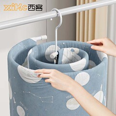 布団の神器の螺旋式のハンガーの円形の折り畳みのハンガーはシングルのベランダで螺旋干しのメーカーの卸売りができます。