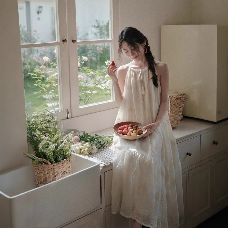 Yunnan Western Sanya Beach French Neck dress Women's 2025 Summer New Sleeveless Holiday Style Long Dress