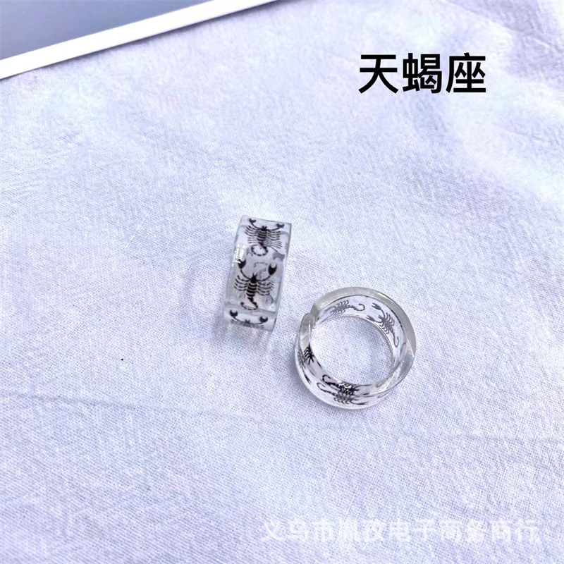 Nuevo 12 constelación patrón acrílico resina anillo transparente personalidad ajustable anillo transfronterizo Venta caliente exclusivo