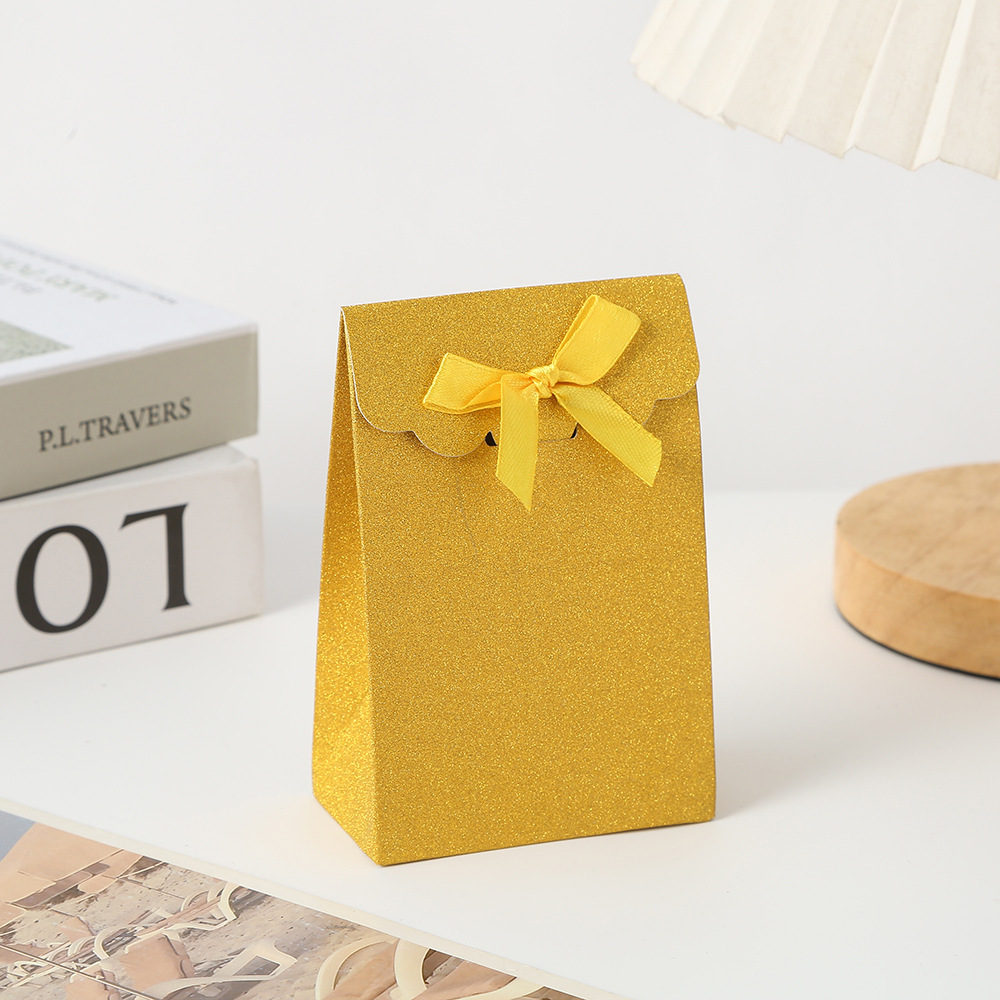 Bolsa de papel de cartón blanco con solapa de cebolla brillante Bolsa de embalaje de regalo de color caramelo Bolsa de embalaje de postre con lazo de sentido avanzado Bolsa de caramelo