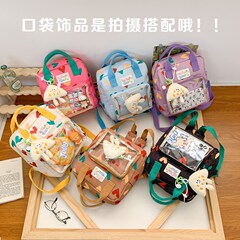 幼稚園の赤ちゃんの小さいかばんの甘い愛の洋気の透明な小さい窓の男女の子供のランドセルの新型の子供のリュックサック