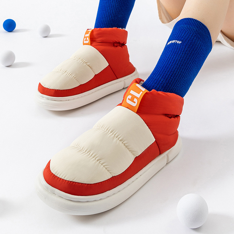 Amazon transfronterizo nuevo Otoño e Invierno mediados de la parte superior de los zapatos acolchados de algodón de color de contraste hombres y mujeres pareja usan felpa cálida