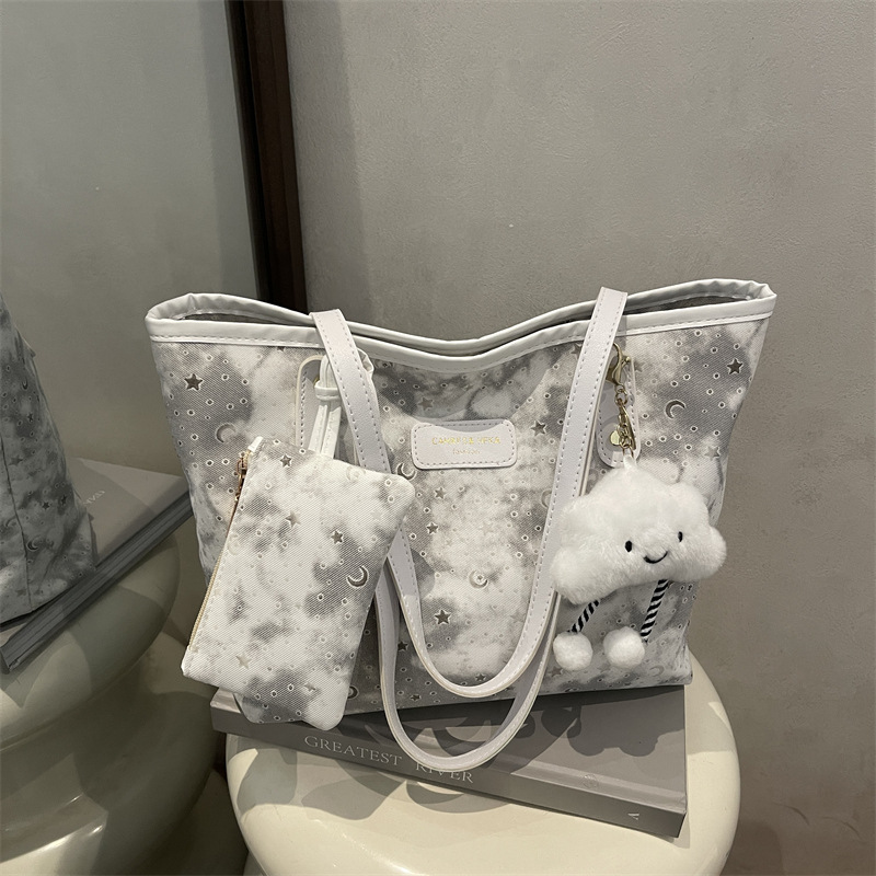 Bolso de moda de moda temperamento versátil bolso de hombro de gran capacidad 2026 nuevo bolso de brazo de viaje simple casual