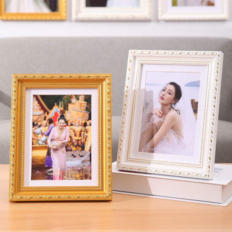 golden wall photo frame from natural wood