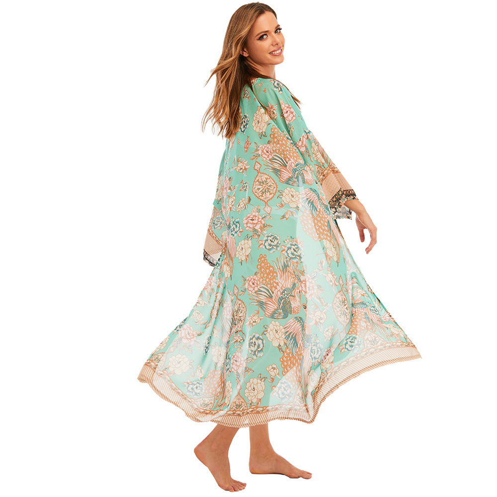 Playa blusa europea y americana gasa impreso vacaciones cardigan playa falda bikini protección solar traje de baño fuera XF59