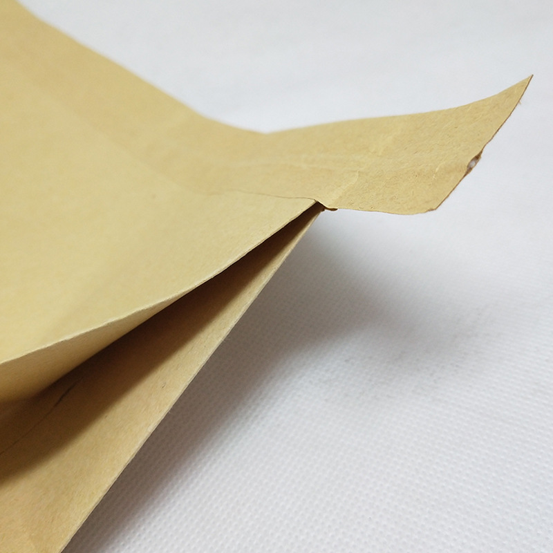 Bolsa compuesta de papel plástico trenzada bolsa a prueba de humedad grosada bolsa kraft mayorista expreso logística química polvo materia prima sellado