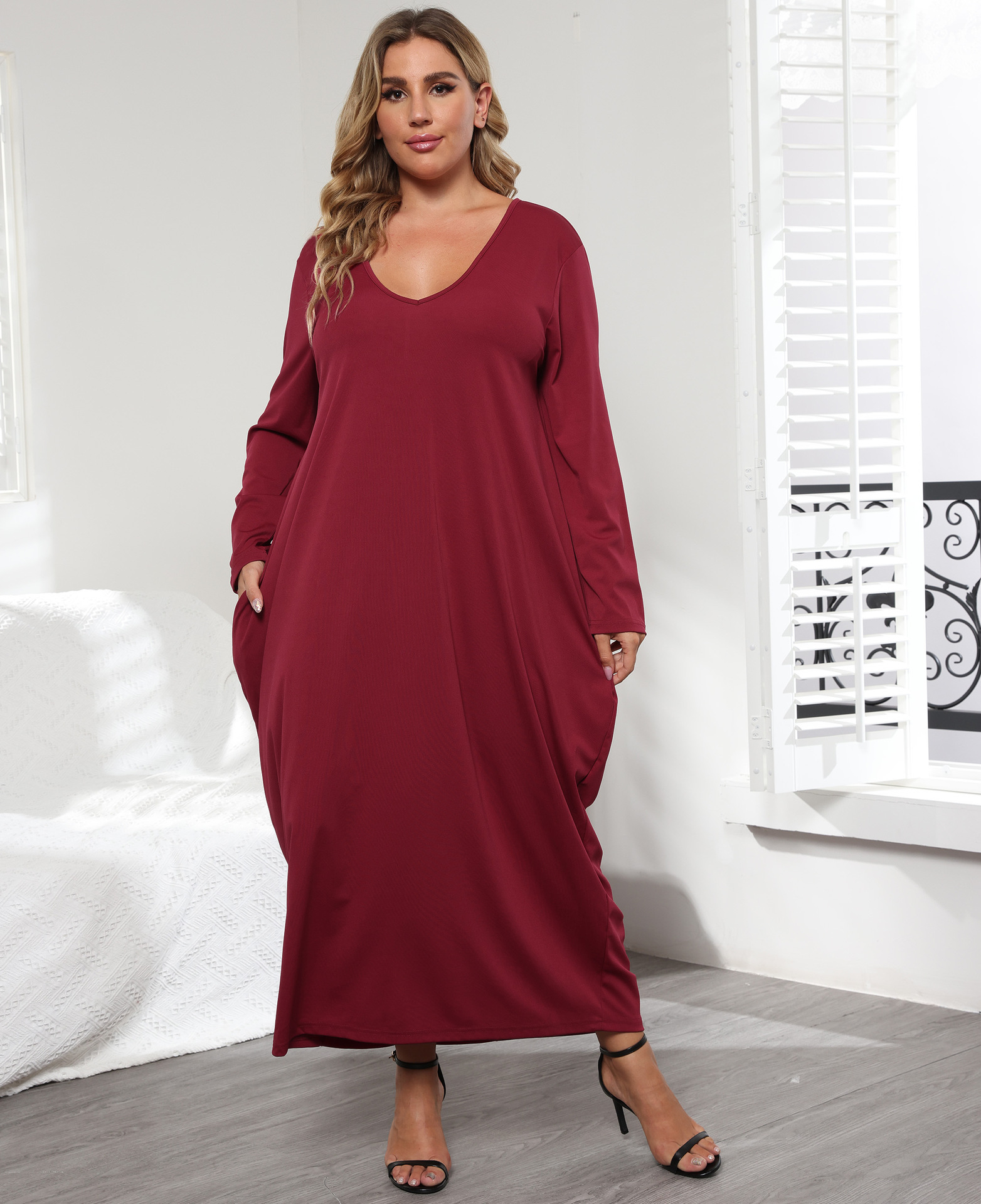 plus size V-neck loose long-sleeved double-pocket lace-up solid color dress NSOY125578