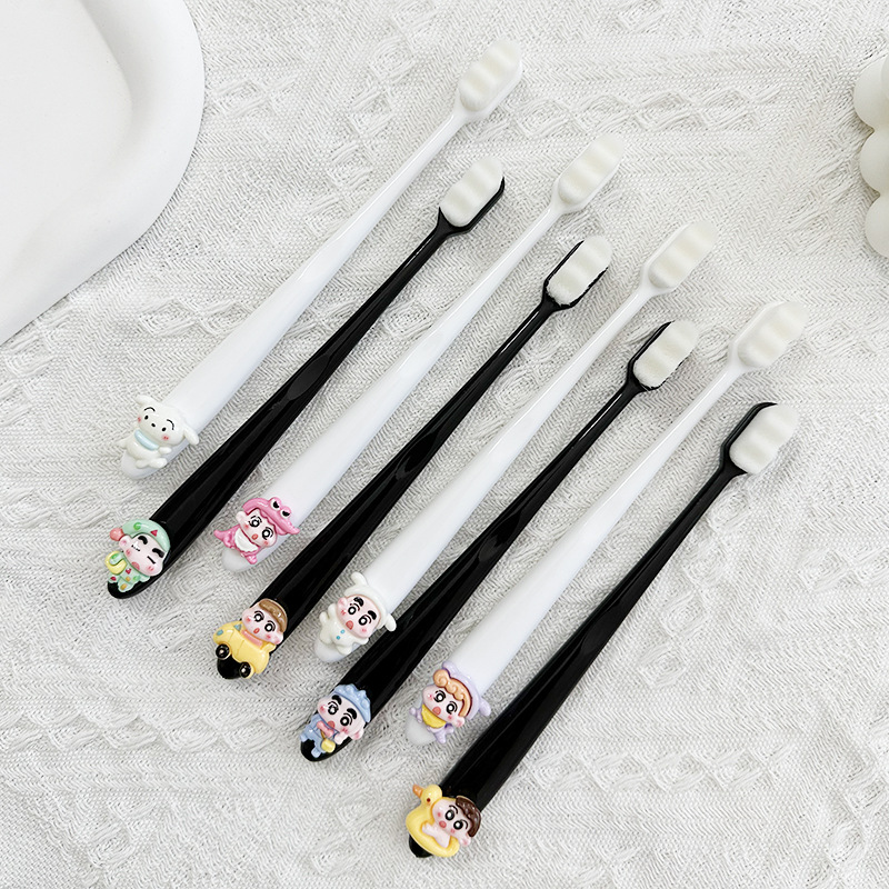 Soft universal cartoon toothbrush for children and adults