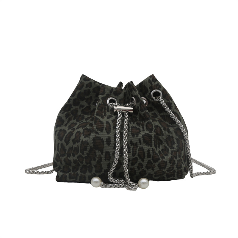 Bolso de leopardo rojo en línea para mujeres 2024 nuevo popular nicho de diseño de cadena bolso de cinturón mini bolso de cubo de cuerda