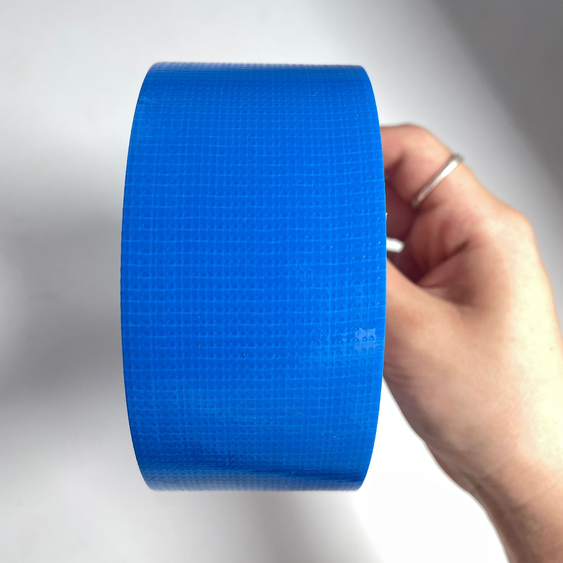 Tape adhesiva de tela de alta viscosidad decoración sin rastro película adhesiva de tela de malla adhesiva de tela unilateral cinta adhesiva de tela