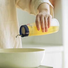 プラスチックのジャージャーの台所は調味料の瓶のジャージャーを押しつぶすことができます。