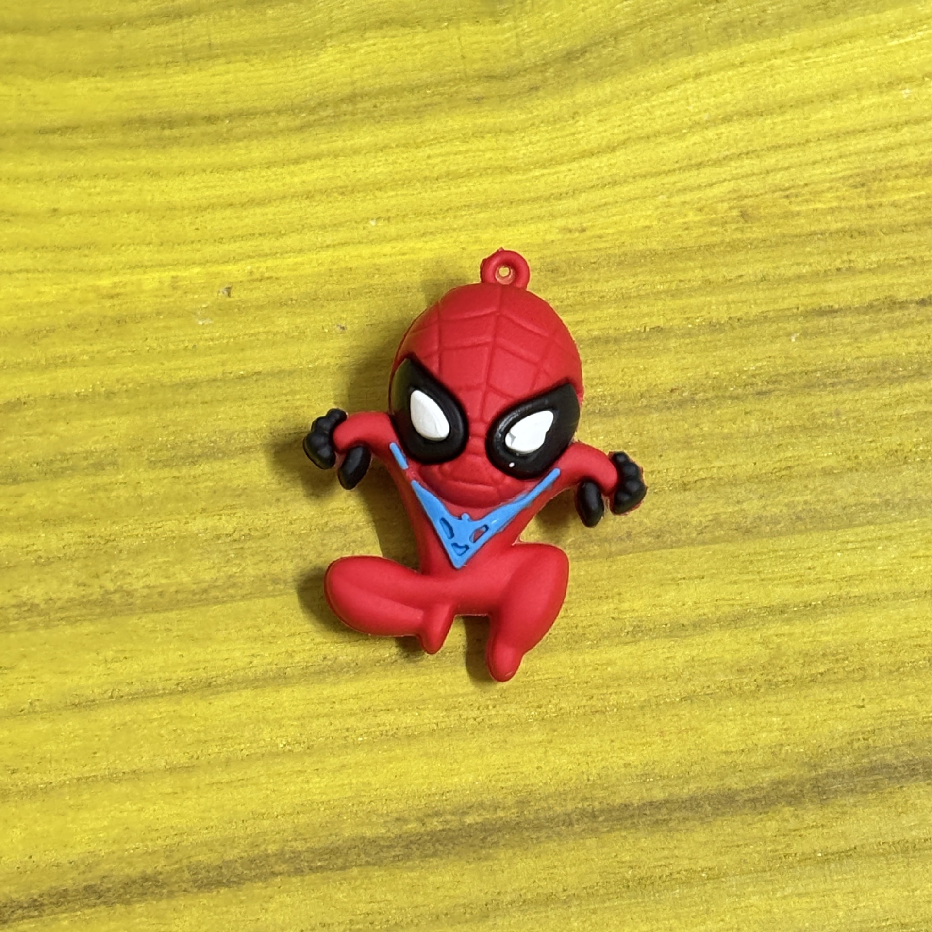 Red doll, Spiderman