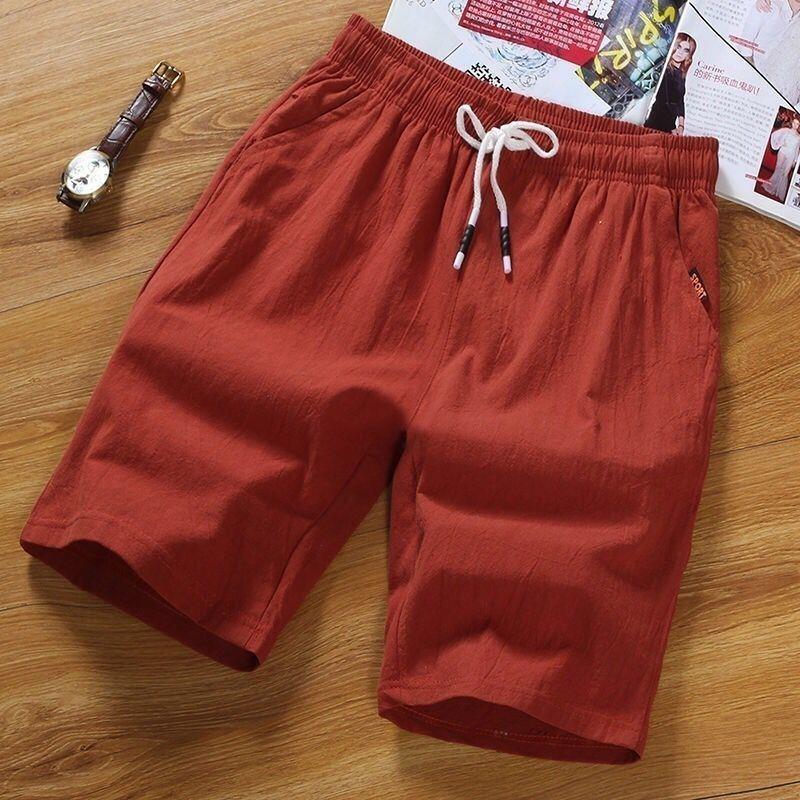 Pantalones cortos casuales pantalones finos de cinco puntos de algodón y lino para hombre, pantalones sueltos de color sólido, pantalones de todo fósforo, estilo coreano, hermosos pantalones cortos de playa, marea