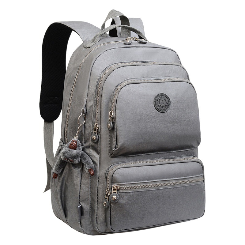 Nueva Mochila De tela impermeable pequeño mono colgante multi-compartimiento Mochila GRANDE mochila de viaje para estudiantes masculinos y femeninos