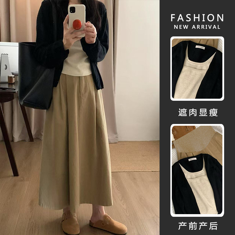 Au printemps, les femmes enceintes ont des hauts minces et amples, des vestes en tricot et des vestes cardigan en tricot pour femmes en jupe kaki