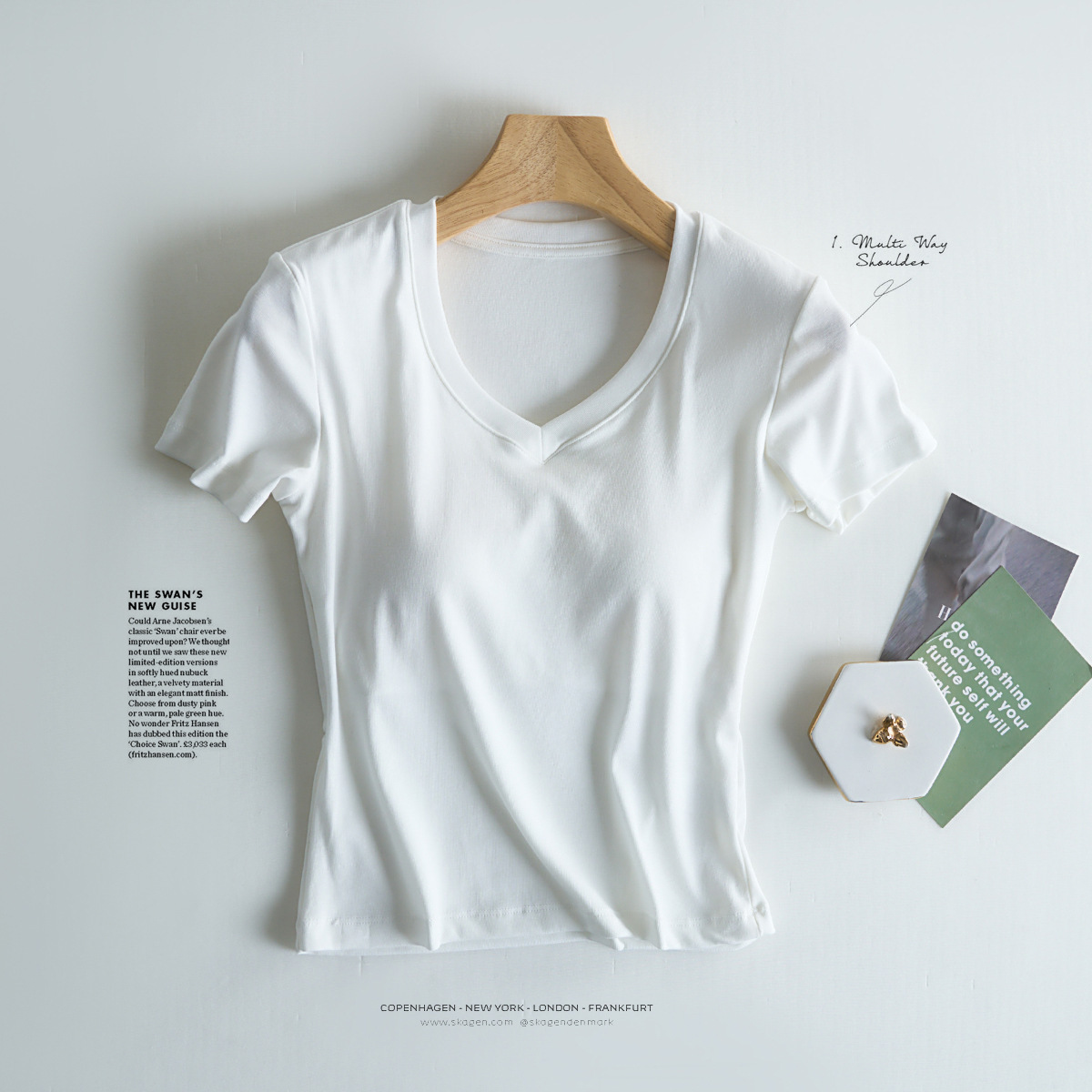 Tensei Lesser Almohadilla para el pecho con cinturón de algodón para mujer Camiseta blanca de manga corta con cuello en V para mujer Verano nuevo top casual de nicho de hombro