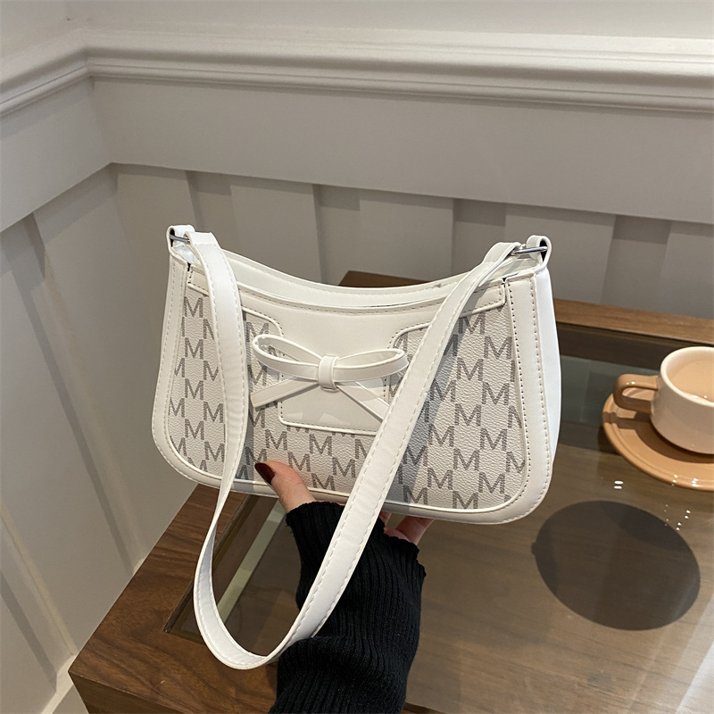2025 primavera nuevo estilo simple ocio retro bolso de brazo bolso de moda de mujer bolso de nicho coreano bolso de hombro